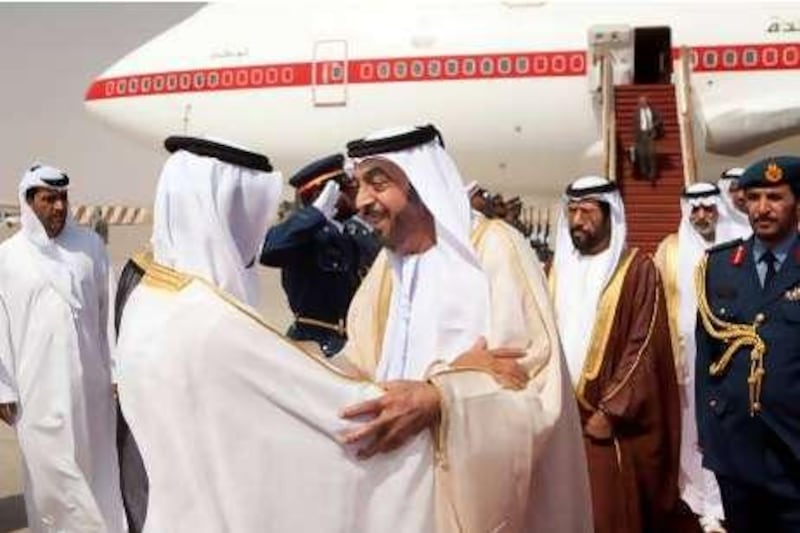 ABU DHABI, UNITED ARAB EMIRATES - September 17, 2010: (center) HH Sheikh Khalifa bin Zayed Al Nahyan President of the UAE and Ruler of Abu Dhabi is received by family and friends at Al Ain Airport upon returning from a trip abroad. ( Ryan Carter / Crown Prince Court - Abu Dhabi )