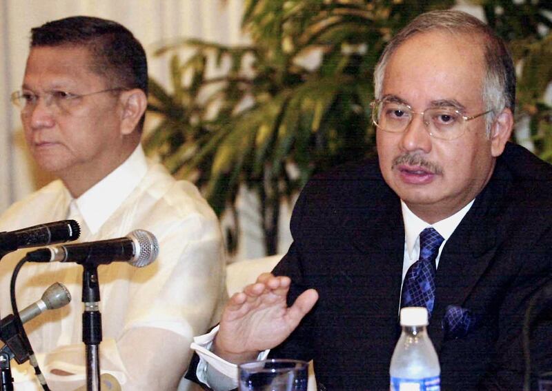 Then Malaysian defence minister Najib Razak, right, speaks at a news conference in Manila in 2003. AFP