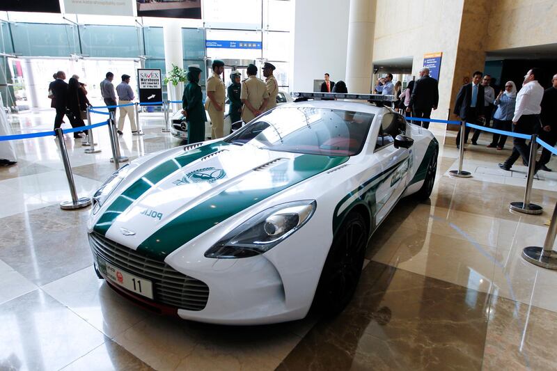 Dubai, May 6, 2013 - Dubai Police showed off their new fleet of luxury patrol cars including an Aston Martin ONE77 at the Arabian Travel Market at Dubai International Convention and Exhibition Centre, May 6, 2013.(Photo by: Sarah Dea/The National)

