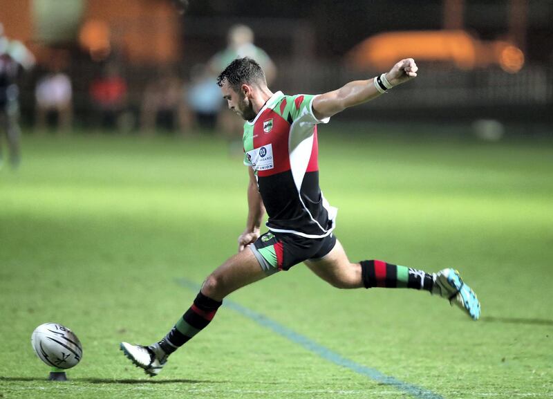 Abu Dhabi, United Arab Emirates - October 12, 2018: Quins' Luke Stevenson kicks a pen in the game between Abu Dhabi Harlequins and Dubai Hurricanes in the West Asia Premiership. Friday, October 12th, 2018 at Zayed Sports City, Abu Dhabi. Chris Whiteoak / The National