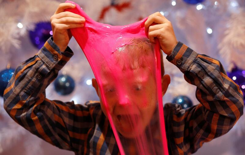 A youngster plays with Elasti Plasti at the launch of Hamleys top Christmas toys, in London, UK. Peter Nicholls/Reuters