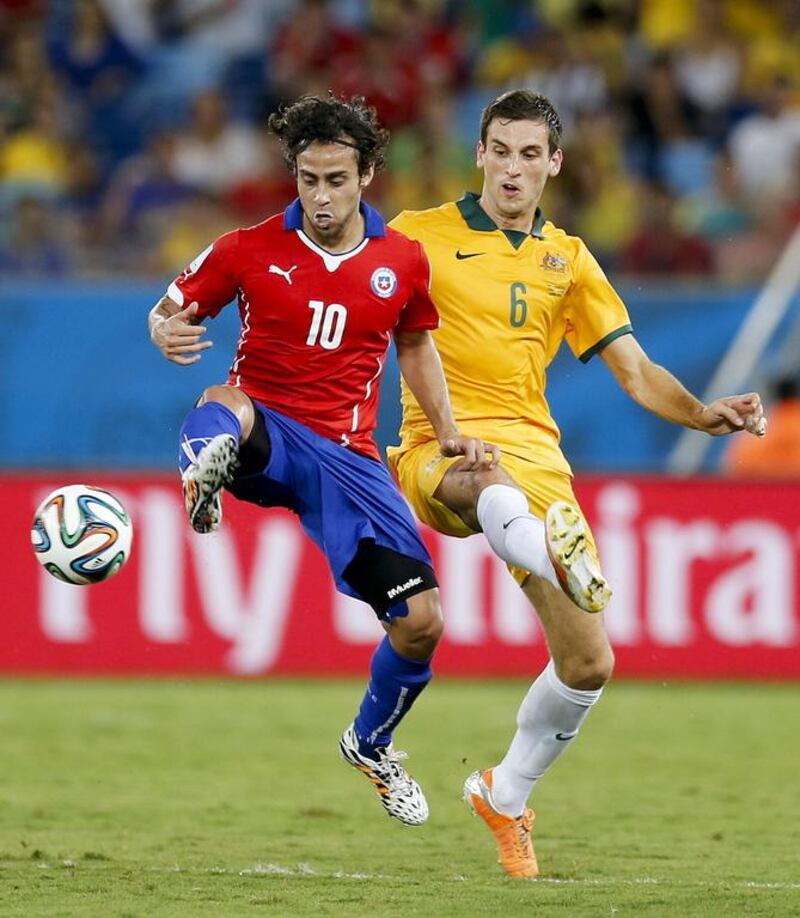 Jorge Valdivia, left, shown here playing for Chile in the 2014 World Cup this summer, has claimed wrongdoing by Fujairah of the Arabian Gulf League during their recent contract negations. AP Photo/Frank Augstein