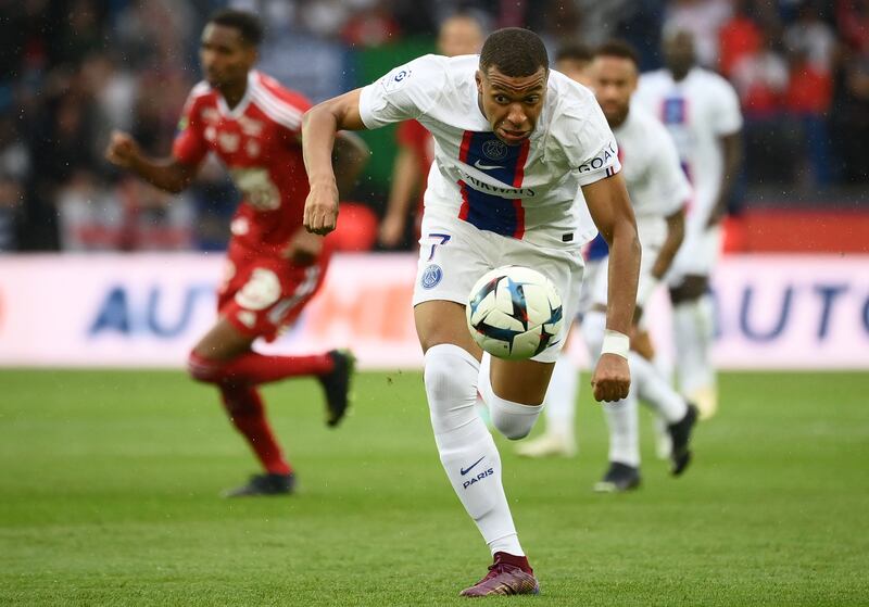 Kylian Mbappe runs with the ball. AFP