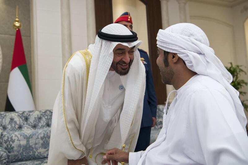 ABU DHABI, UNITED ARAB EMIRATES - June 15, 2018: HH Sheikh Mohamed bin Zayed Al Nahyan Crown Prince of Abu Dhabi Deputy Supreme Commander of the UAE Armed Forces (L), speaks with a guest during an Eid Al Fitr reception at Mushrif Palace. 

( Saeed Al Neyadi / Crown Prince Court - Abu Dhabi )
---