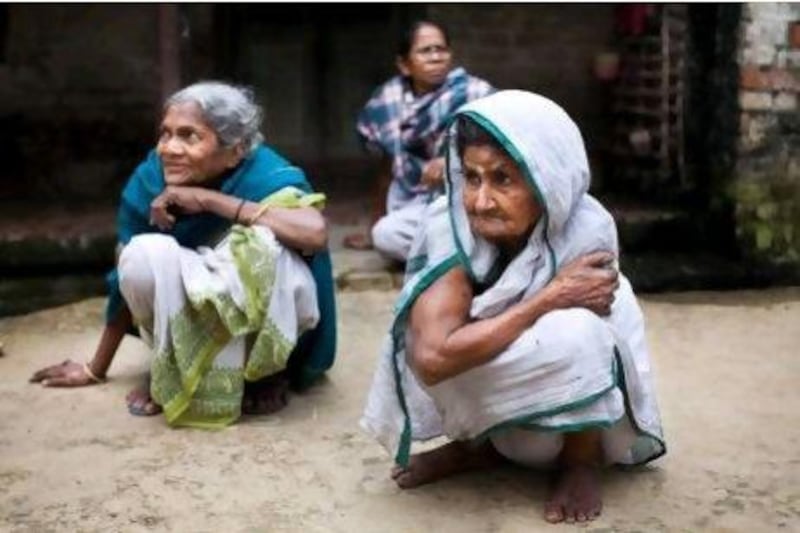 Saraswati Saha, left, and Kamla Das, have lived in Cooper’s Camp in West Bengal since 1947. They are among an estimated 5.4 million Bangladeshis who live in West Bengal.