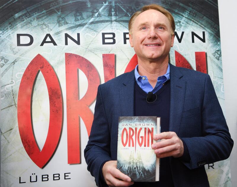 U.S. author Dan Brown presents his new book 'Origin' at the book fair in Frankfurt, Germany, Thursday, Oct. 12, 2017. (Arne Dedert/dpa via AP)