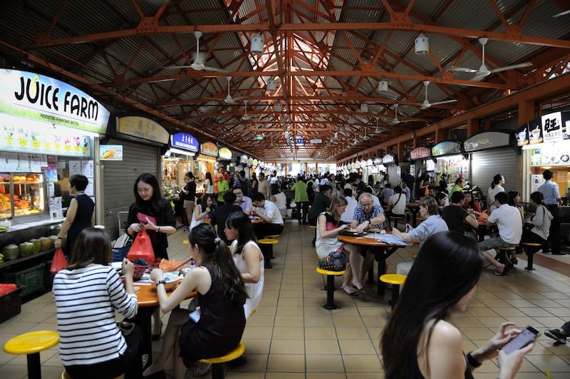 Hawker centres are open-air, sheltered buildings that house rows of cooked food stalls selling a variety of food, drinks and dessert.