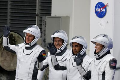 European Space Agency astronaut Matthias Maurer of Germany and Nasa astronauts Raja Chari, Tom Marshburn and Kayla Barron wave at the Kennedy Space Centre in Cape Canaveral, Florida, on November 10, 2021. Reuters