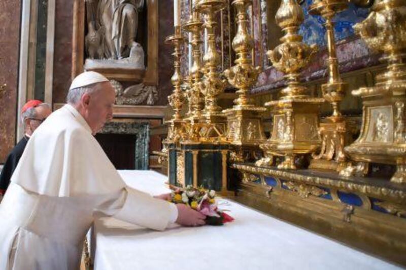 Newly elected Pope Francis I makes a private visit to the 5th-century Basilica of Santa Maria Maggiore to pray for guidance barely 12 hours after his election.