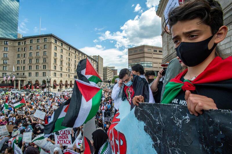 People across to the world took to the streets at the weekend in support of Palestine. At Copley Square in Boston, Massachusetts, the flag of Palestine is carried as thousands gather at a rally. AFP