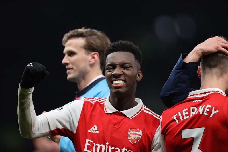 Arsenal striker Eddie Nketiah celebrates on the pitch. AFP