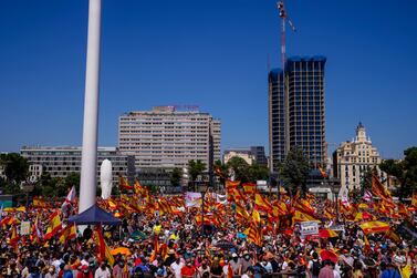 Protesters stage a rally in Madrid on Sunday demonstrating against potential pardon for Catalan separatists. AP  