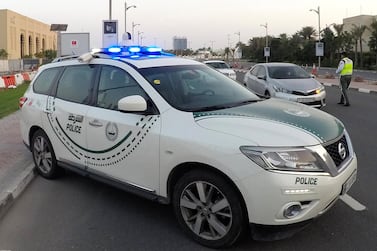 A motorist was badly injured after he crashed into a pickup truck on Al Asayel road on Tuesday. Pawan Singh / The National