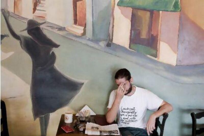 Syrian activist 'Kinan' photographed in a cafe in Beirut.