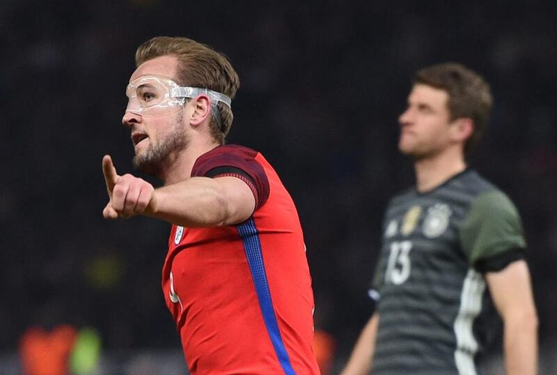 England’s Harry Kane (L) celebrates after scoring the 2-1 during the international friendly soccer match between Germany and England in Berlin, Germany, 26 March 2016.  EPA/ANNEGRET HILSE