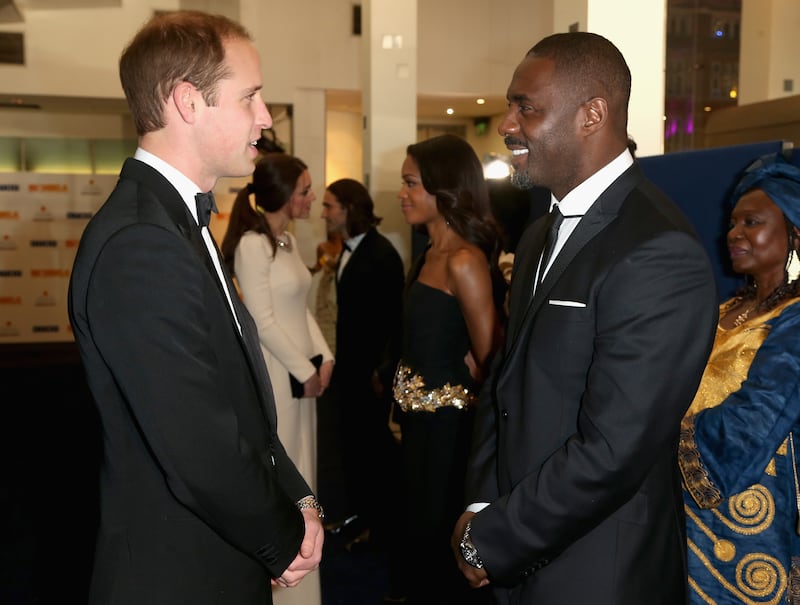 Prince William meets actor Idris Elba at the Royal film performance of 'Mandela: Long Walk to Freedom' at Odeon Leicester Square on December 5, 2013 in London. WPA Pool/Getty Images