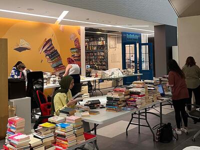 Volunteers are coming out to help sort through the books at Bookends. Photo: Bookends