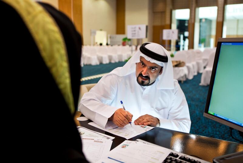 Candidates register to stand in the Federal National Council election on Wednesday, August 17, 2011, the last day of registration at the Abu Dhabi National Exhibition Center in Abu Dhabi. The previous three days brought in 71 people. (Silvia Razgova/The National)


