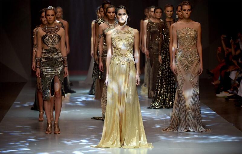 Models walk the runway at the Dany Tabet show during Fashion Forward at Madinat Jumeirah on October 5, 2014 in Dubai, United Arab Emirates. Ian Gavan / Getty Images for Fashion Forward