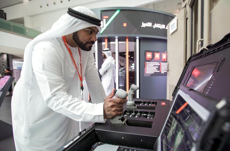 Abu Dhabi, United Arab Emirates, February 24, 2020.  The Unmanned Systems Exhibition and Conference (UMEX 2020) and Simulation Exhibition and Conference (SimTEX 2020).
--  Ahmed Al Shehhi domonstrates the EARTH, remote control container system.
Victor Besa / The National
Section:  NA
Reporter:  None