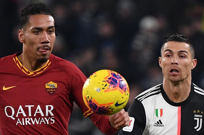 Chris Smalling and Juventus Cristiano Ronaldo. AFP