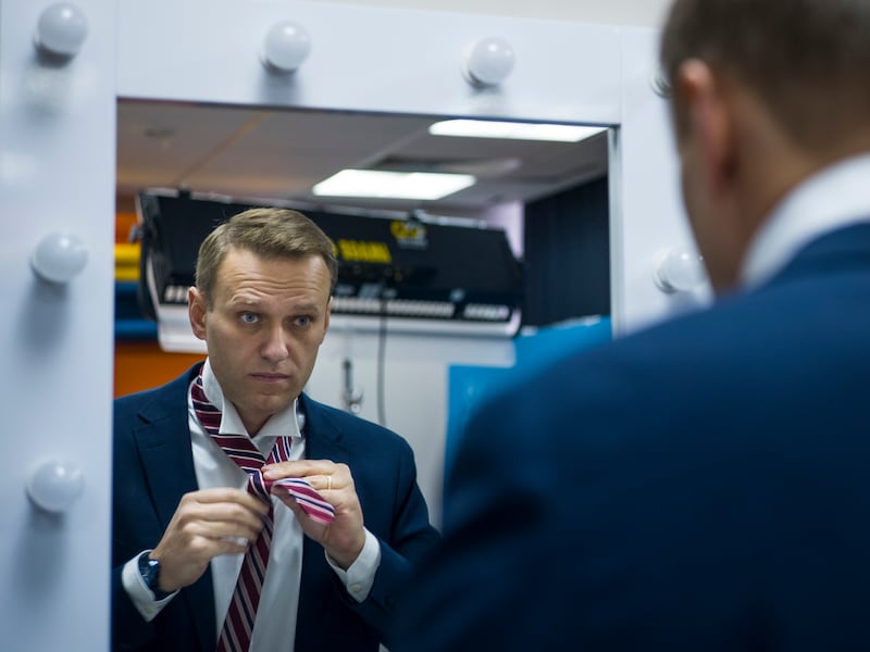 Mr Navalny prepares for an interview with The Associated Press in Moscow, in 2017. AP
