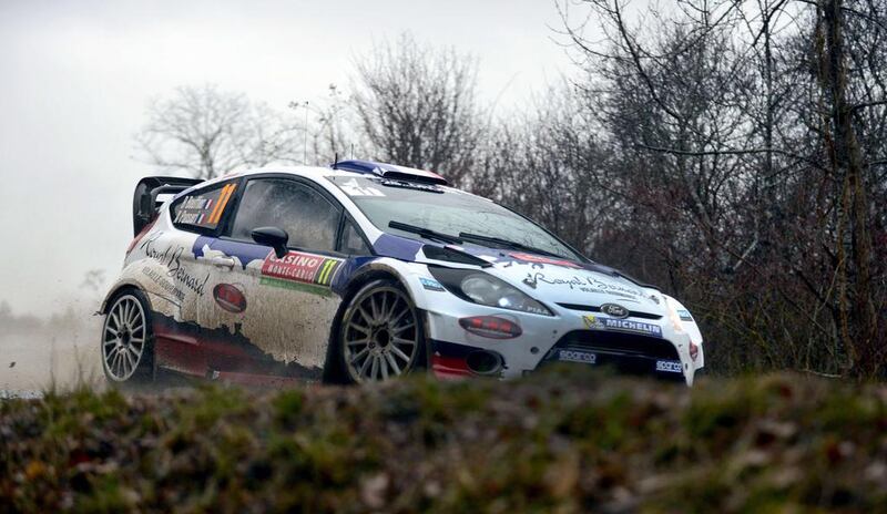 French driver Bryan Bouffier steers his Ford Fiesta RS in Rosans, southeastern France, on Thursday during the fifth stage of the Rally Monte Carlo. Jean-Pierre Clatot / AFP