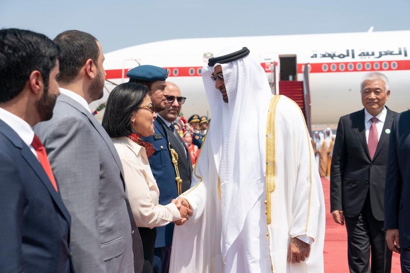 Sheikh Mohamed bin Zayed is welcomed by Chinese officials upon landing in Beijing on Sunday. Rashed Al Mansoori / Ministry of Presidential Affairs