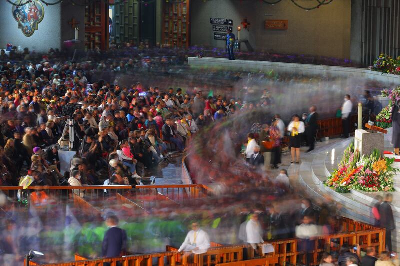 Pilgrims visit the image of the Virgin of Guadalupe inside the Basilica of Guadalupe in Mexico City. Getty Images