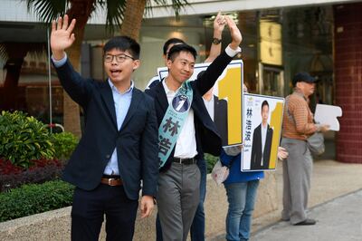 Hong Kong pro-democracy activist Joshua Wong campaigns for Kelvin Lam, a candidate in Sunday’s district council elections in Hong Kong, China November 23, 2019. REUTERS/Laurel Chor
