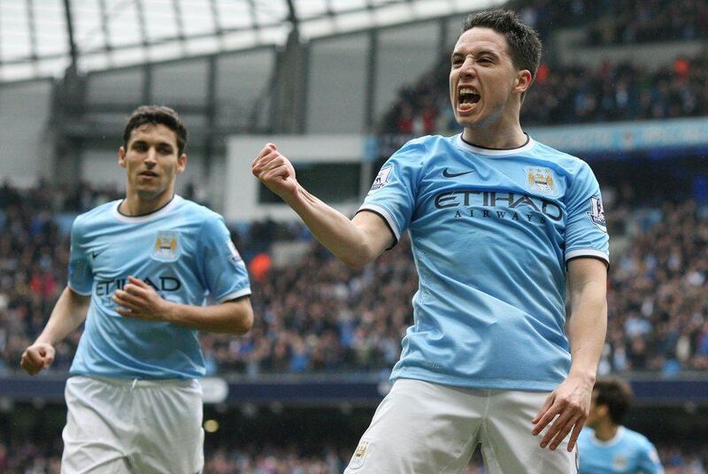 Manchester City midfielder Samir Nasri celebrates scoring their second goal against Southampton. Lindsey Parnaby / AFP / Apri 5, 2014