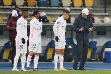 Soccer Football - Champions League - Group B - Shakhtar Donetsk v Real Madrid - NSC Olimpiyskiy, Kyiv, Ukraine - December 1, 2020 Real Madrid coach Zinedine Zidane with Mariano, Isco and Vinicius Junior who come on as substitutes REUTERS/Gleb Garanich