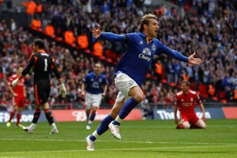 Everton's Nikica Jelavic (C) celebrates his goal against Liverpool during their English FA Cup semi-final soccer match at Wembley Stadium in London April 14, 2012.    REUTERS/Eddie Keogh (BRITAIN - Tags: SPORT SOCCER) *** Local Caption ***  EDY03_SOCCER-ENGLAN_0414_11.JPG