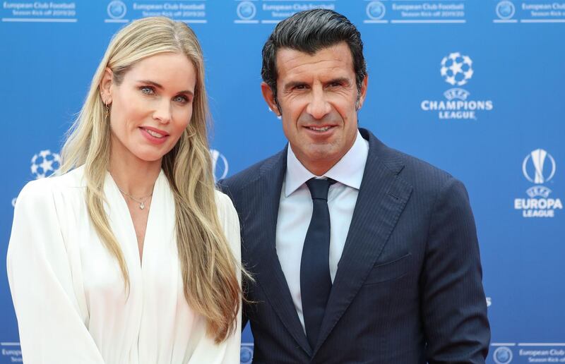 Retired Portuguese footballer Luis Figo and his wife Helen Svedin. AFP