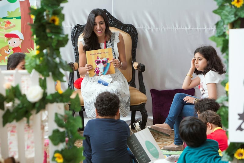 DUBAI, UNITED ARAB EMIRATES - Author Dina Elabd reading her book to kids at the Literature Festival, Dubai Festival City.  Leslie Pableo for the National