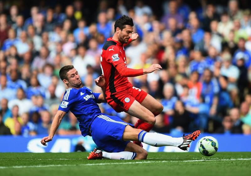 David Nugent of Leicester City is tackled by Gary Cahill of Chelsea during the Barclays Premier League match between Chelsea and Leicester City at Stamford Bridge on August 23, 2014 in London, England. (Photo by Jamie McDonald/Getty Images)