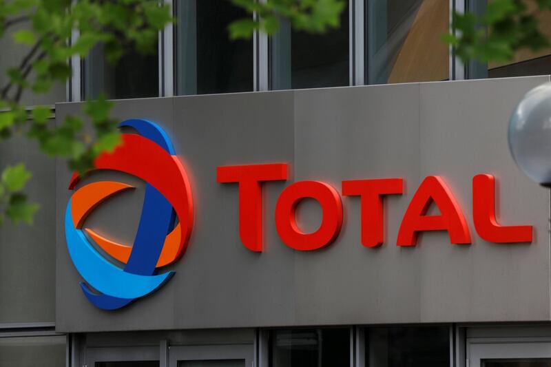 The logo of French oil giant Total is seen at La Defense business and financial district in Courbevoie, near Paris, France. May 16, 2018.  REUTERS/Charles Platiau
