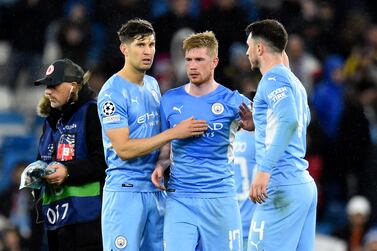 Kevin De Bruyne (C) of Manchester City celebrates with teammates after winning the UEFA Champions League quarter final, first leg soccer match between Manchester City and Atletico Madrid in Manchester, Britain, 05 April 2022.   EPA / PETER POWELL