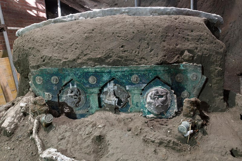 The chariot's iron elements, bronze decorations and mineralised wood still remains. AP