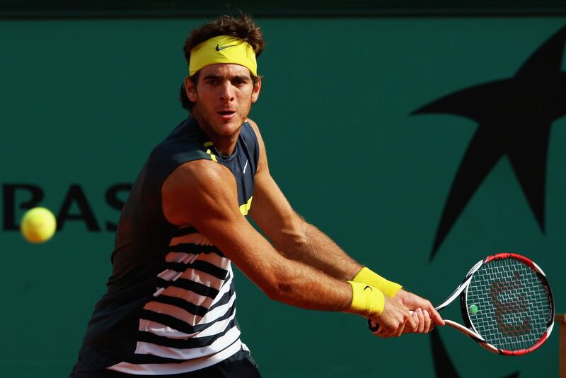 PARIS - JUNE 05:  Juan Martin Del Potro of Argentina hits a backhand during the Men's Singles Semi Final match against Roger Federer of Switzerland on day thirteen of the French Open at Roland Garros on June 5, 2009 in Paris, France.  (Photo by Clive Brunskill/Getty Images)
