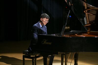 Xu Diwen discovered his passion for the piano at the age of six. Khushnum Bhandari / The National
 