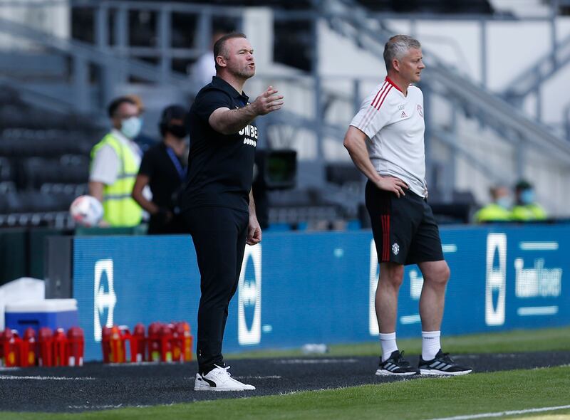 Derby County manager Wayne Rooney and his United counterpart Ole Gunnar Solskjaer