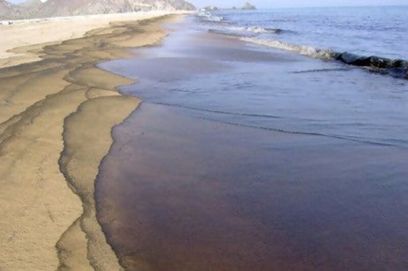 Oil washes up on the beach in Fujairah. Courtesy: Fujairah Rotana Resort & Spa