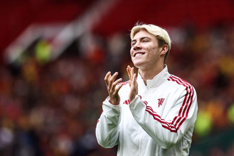 Manchester United's new striker Rasmus Hojlund is unveiled at Old Trafford. AFP