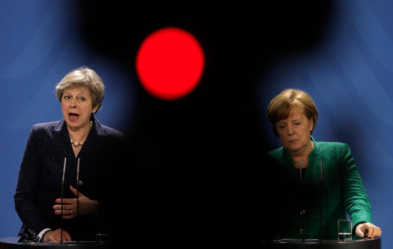 Theresa May during a press conference with German Chancellor Angela Merkel, right, in February 2018. AP Photo