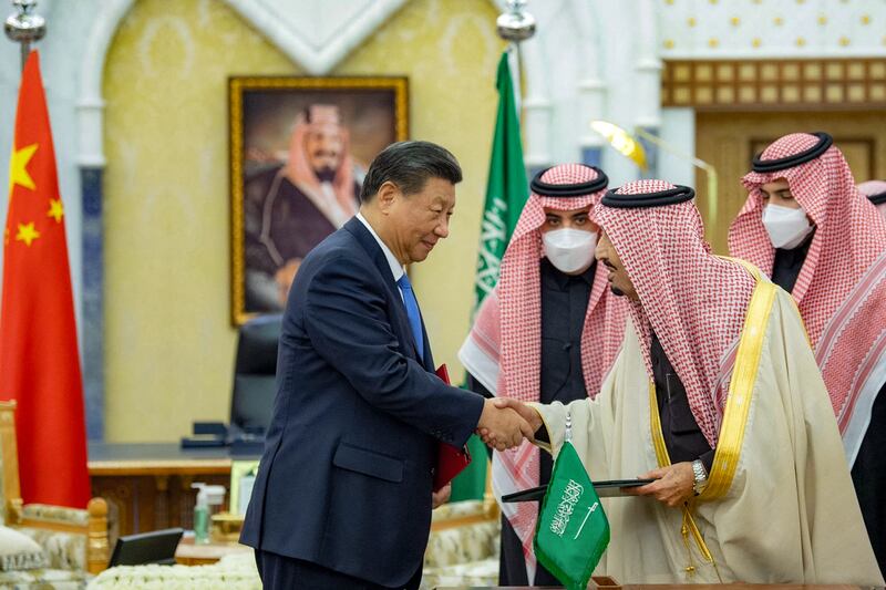 King Salman and Mr Xi agreed to hold meetings every two years. AFP