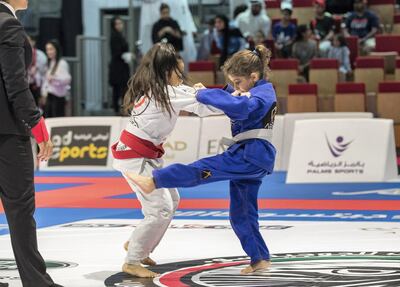 Abu Dhabi, UAE,  April 20, 2018.  Mariam Akeil (blue) VS. Daya Dosanjh.  Kids 3-25 kg. during the semifinals match.
Victor Besa / The National
Sports
Reporter: Amith Passela