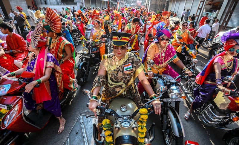 epa07487843 Indian people in traditional clothes take part in the procession to celebrate the Gudi Padwa, Maharashtrian's New Year in Mumbai, India, 06 April 2019. Gudi Padwa is the Hindu festival that falls on the first day of Chaitra month and marks the beginning of the Lunar Calendar, which dictates the dates for all Hindu festivals, also known as Panchang.  EPA/DIVYAKANT SOLANKI