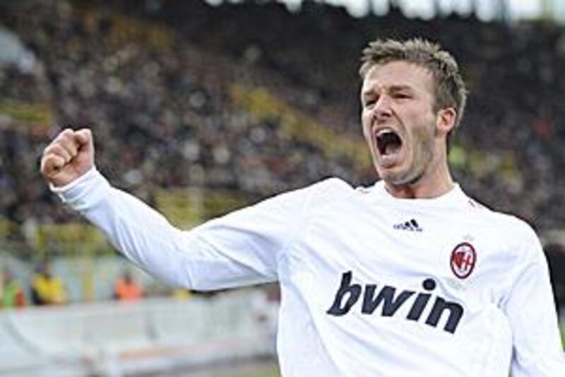 David Beckham celebrates after scoring against Bologna. The England midfielder has impressed since joining Milan on loan from The LA Galaxy.