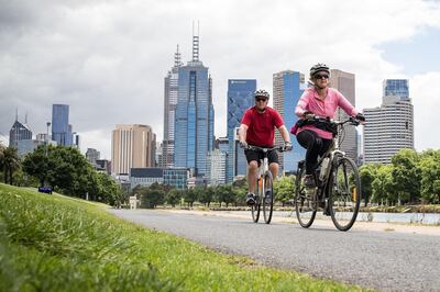 MELBOURNE, AUSTRALIA - NOVEMBER 19: People enjoy riding bicycles along the Yarra River on November 19, 2020 in Melbourne, Australia. Victoria has recorded 20 consecutive days without a new coronavirus case. Lockdown restrictions in Melbourne were lifted on 28 October, after strict measures were imposed on 2 August 2020 following a second wave of COVID-19 cases in the community. (Photo by Darrian Traynor/Getty Images)